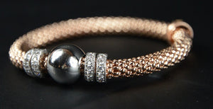 Rose Gold Plated Silver Beaded Stretch Bracelet with multiple Rows of Cubic Zirconia Rings 19cm long - Ceilo Milan - Ninostyle